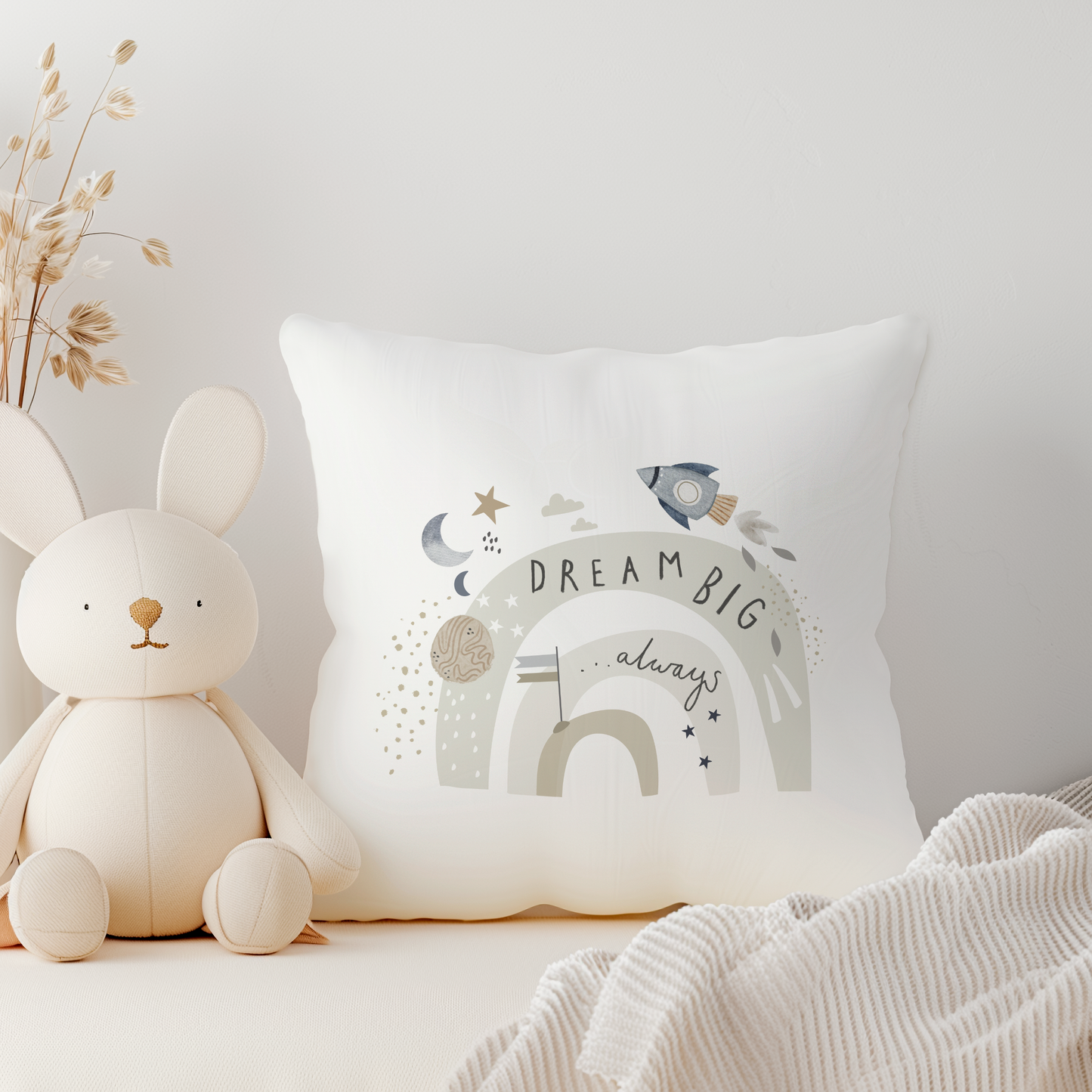 white pillow with dream big always space themed illustration