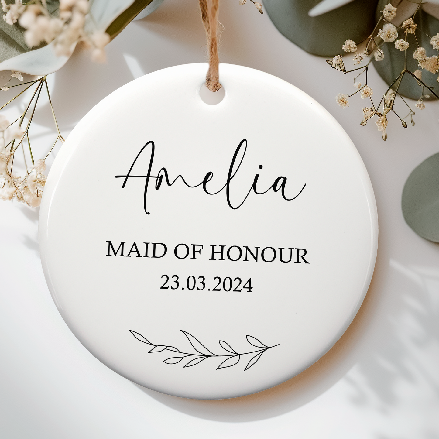 a white ceramic ornament with a floral design
