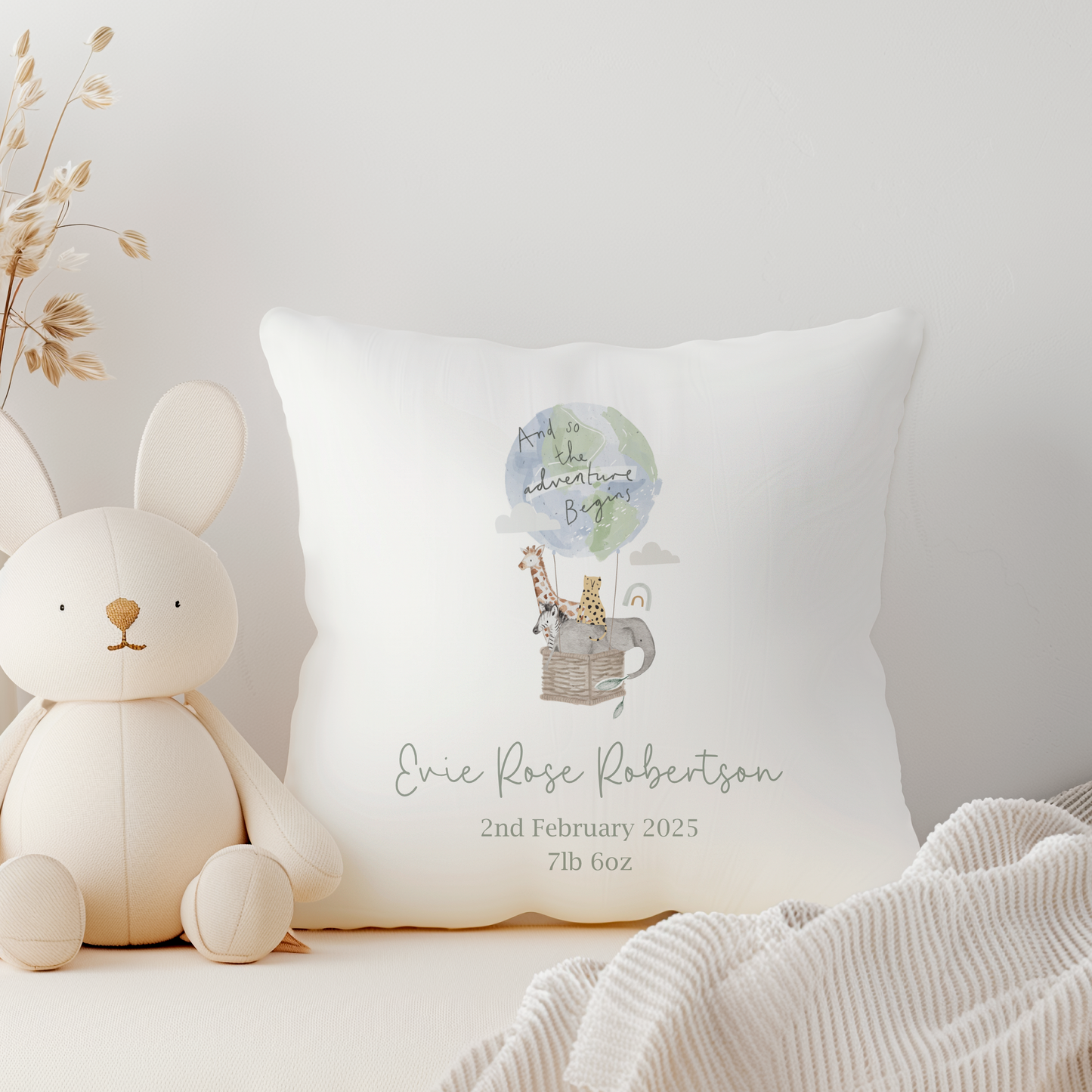 white canvas pillow with hot air balloon jungle animals illustration, personalised with name and birth details
