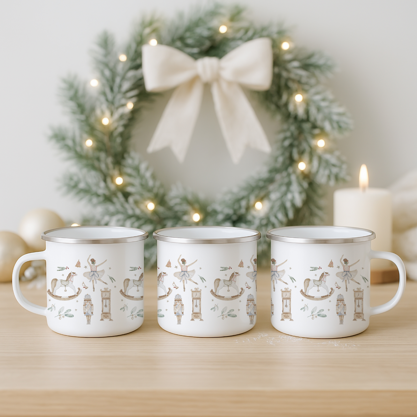Three white mugs with decorative patterns on a wooden surface in front of a Christmas wreath.