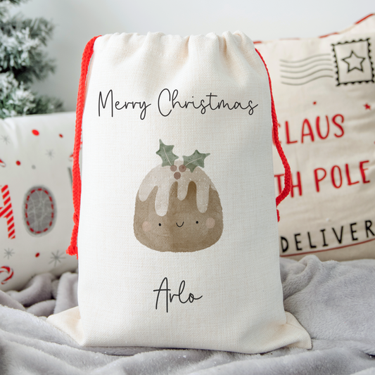 A Santa Sack with cute Christmas pudding illustration. Text of Merry Christmas, personalised with name.