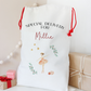 Personalized gift bag with 'Special Delivery for Millie' text and illustrations on a neutral background.