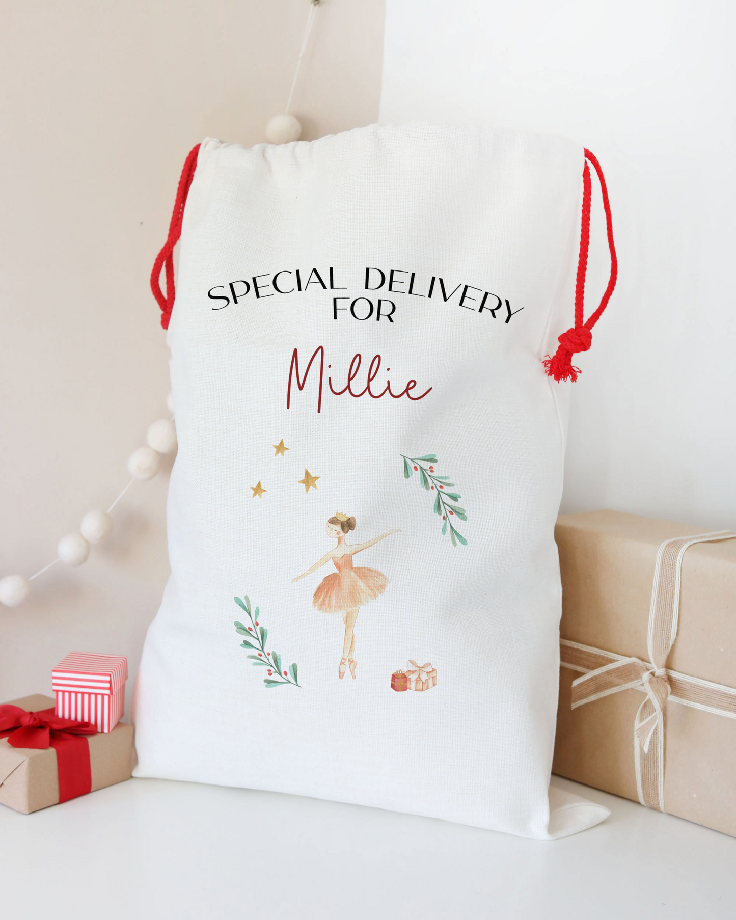 Personalized gift bag with 'Special Delivery for Millie' text and illustrations on a neutral background.