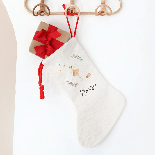 White Christmas stocking with Sugar Plum Fairy design, on a white background