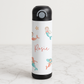 Stainless steel bottle with mermaid design and personalised with name, placed on a marble surface