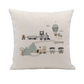 a white pillow with a train and trees on it