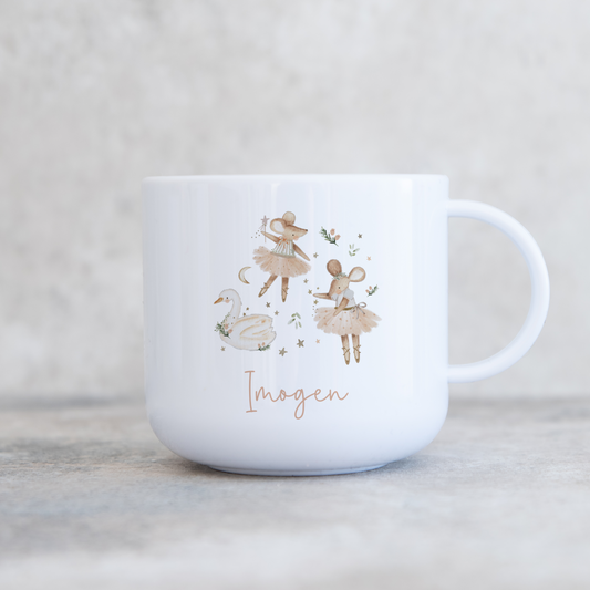 White mug with festive mice design and 'Imogen' text on a light background