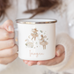 Person holding a mug with name and festive mice and swan illustration