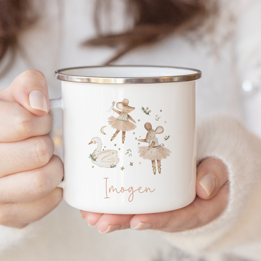 Person holding a mug with name and festive mice and swan illustration