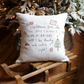 White canvas cushion with Christmas Eve magical text. Santa and Christmas tree illustrations.