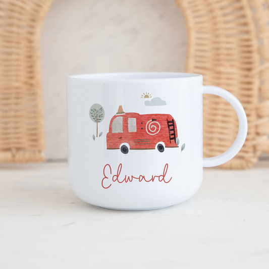 White mug with red fire engine and 'Edward' text on a light background