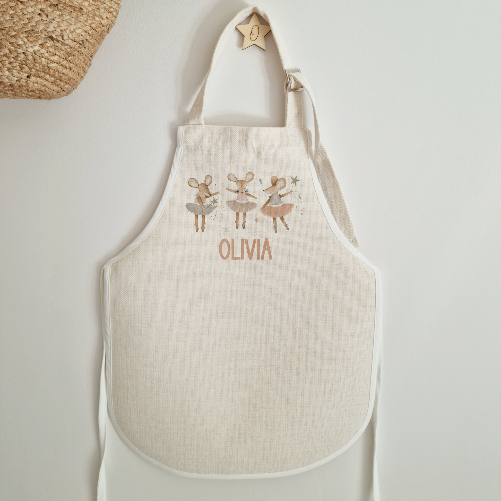 Off white linen-like childs apron. Personalised with name and three ballerina mice