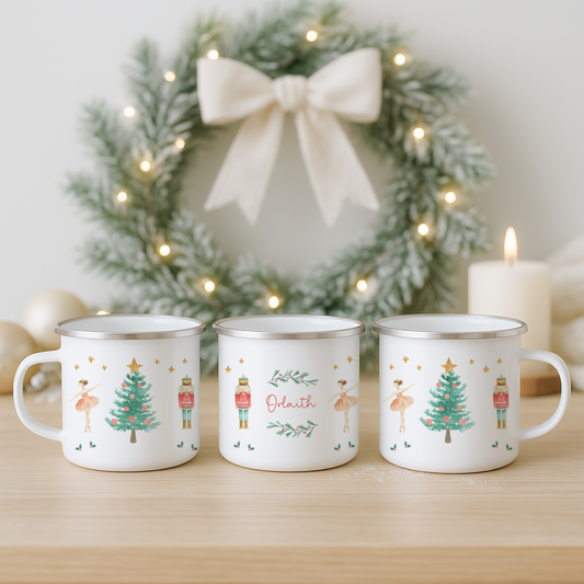 Three Nutcracker-themed mugs on a wooden surface with a decorated wreath in the background.