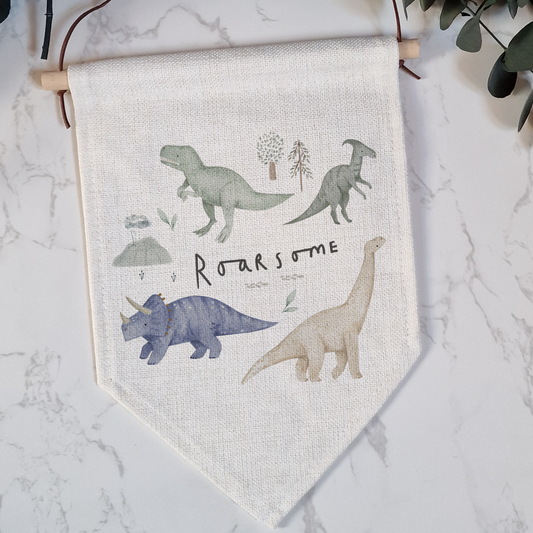 Linen pennant flag with dinosaur illustration and "roarsome" text