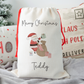 Off white santa sack with father christmas illustration and personalised with name