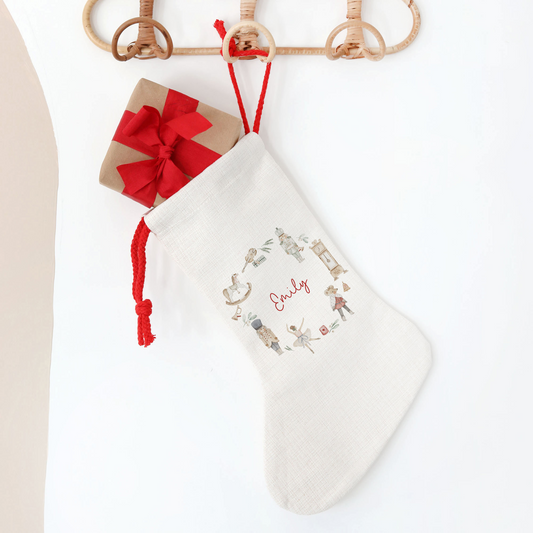 White Christmas stocking with decorative nutcracker elements on a white background
