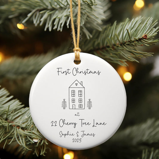 White ceramic ornament for first Christmas in new home with cute house doodle, personalised with address, names and year