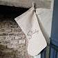 Minimalist Linen Christmas Stocking, personalised with name in black font
